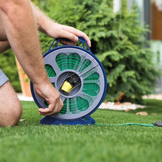 Set de irigare complet – furtun textil flexibil de 15 metri cu tambur și pistol de pulverizare 7 în 1